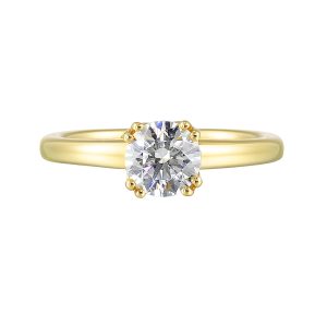 Chic and unique, this double prong setting solitare adds to the sleek, classic look to her style.