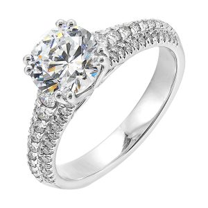 Three rows of micro pave diamonds tappering at the bottom adorns the shank highlighting the center diamond beautifully.