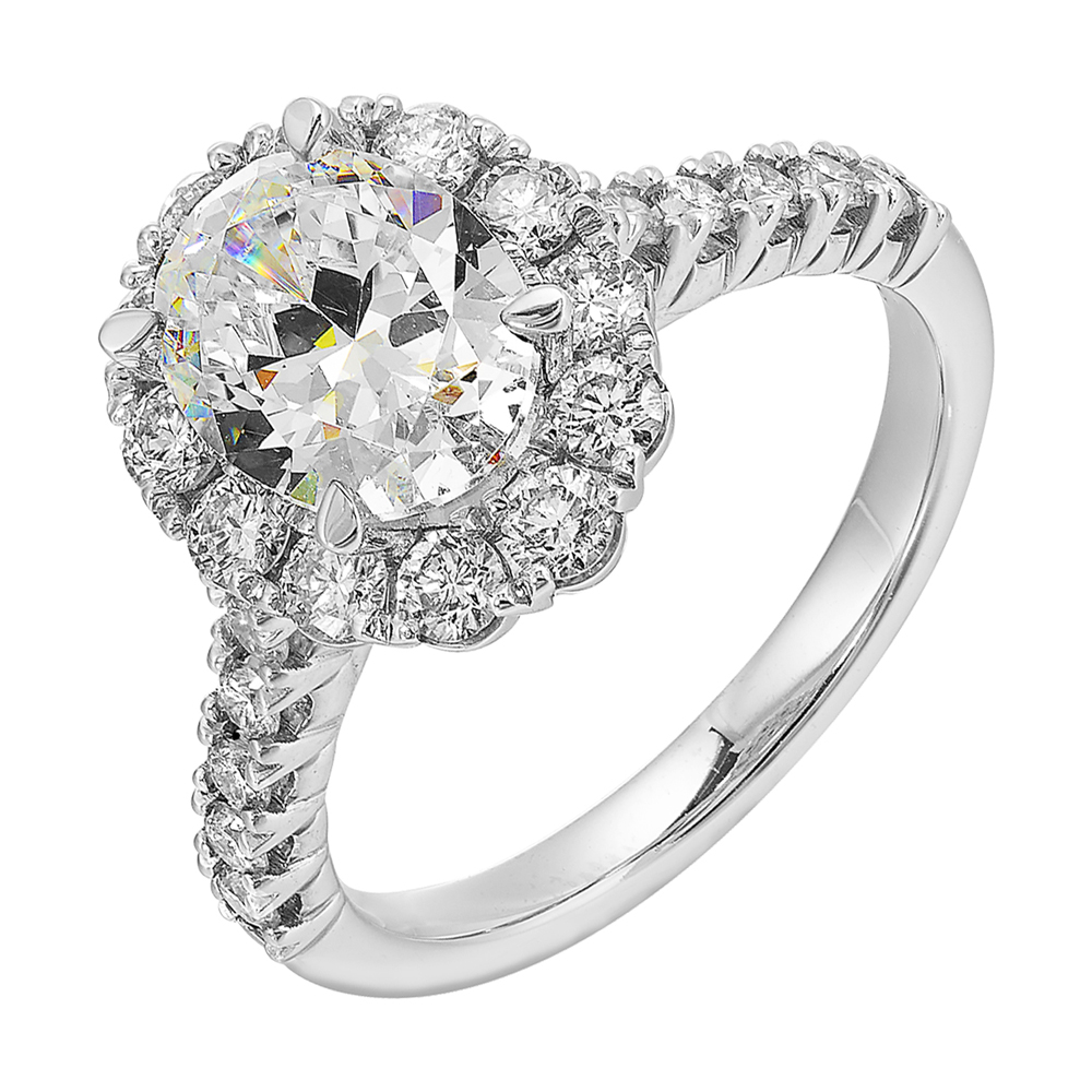 Featuring a mesmerizing floral halo around the solitare diamond adorned with sparkling diamonds on the shank is perfect for the classic you.