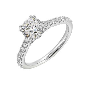 Celebrate a dazzling solitaire diamond set in dual prong on a sleek diamond shank making it a cherished symbol of your love.