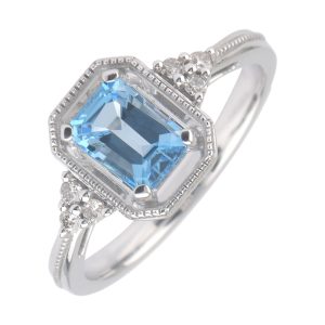 Silver Diamond 1/20Ctw & Blue Topaz 1 1/4Ctw Ring