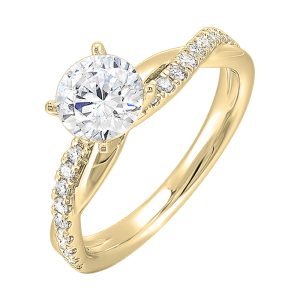 A stunning solitaire, embraced by a criss cross shank adorned with alternating flow of dazzling diamonds is sure to captivate her look.
