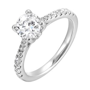 Delicate pave diamonds pinched towards the top add a touch of modern look, highlighting the solitare even further.