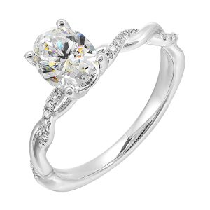 This ring is is sure to surprise her, featuring an oval center which is further enhanced by play of diamond and metal twist shank.