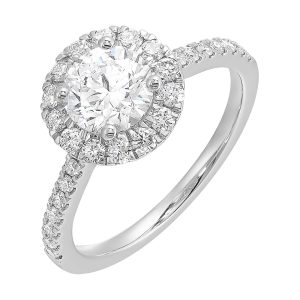 Dazzle with classic round solitaire framed by a sparkling halo. The studded shank adds a touch of classic look, making this ring a timeless symbol of elegance.