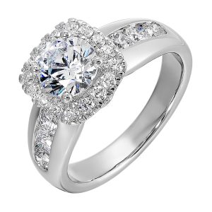 Channel set diamonds wrap this glamorous ring with an addition of cushion halo and solitaire center.
