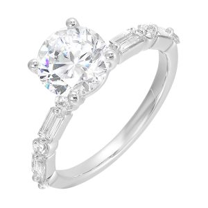 Baguette and round diamond story create a classic, elegant presentation for the round diamond center.