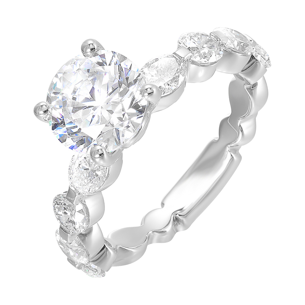 Gorgeous as you marqusie and round diamonds are set alternatively in the shank with round solitaire of this modern engagement ring.