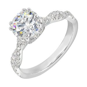 Stunning with a round solitaire diamond set in dual prongs atop a modern crisscross band. The unique twist on timeless elegance is perfect for the modern bride.