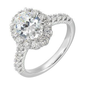Featuring a mesmerizing floral halo around the solitaire diamond adorned with sparkling diamonds on the shank is perfect for the classic you.
